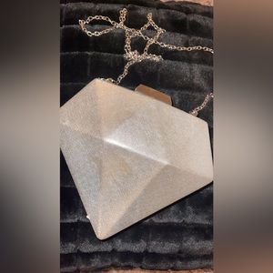 Silver diamond shaped clip bag
